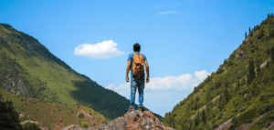 Hiker looking out over mountains