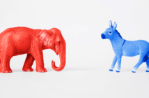 Red elephant and blue donkey facing each other