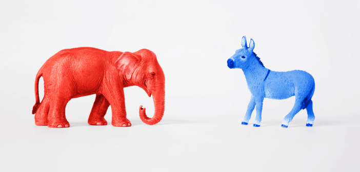 Red elephant and blue donkey facing each other