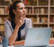 Pastor in front of a computer trying to think of what to write